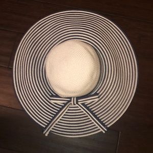 Navy and white hat with bow / Carnival cruise line